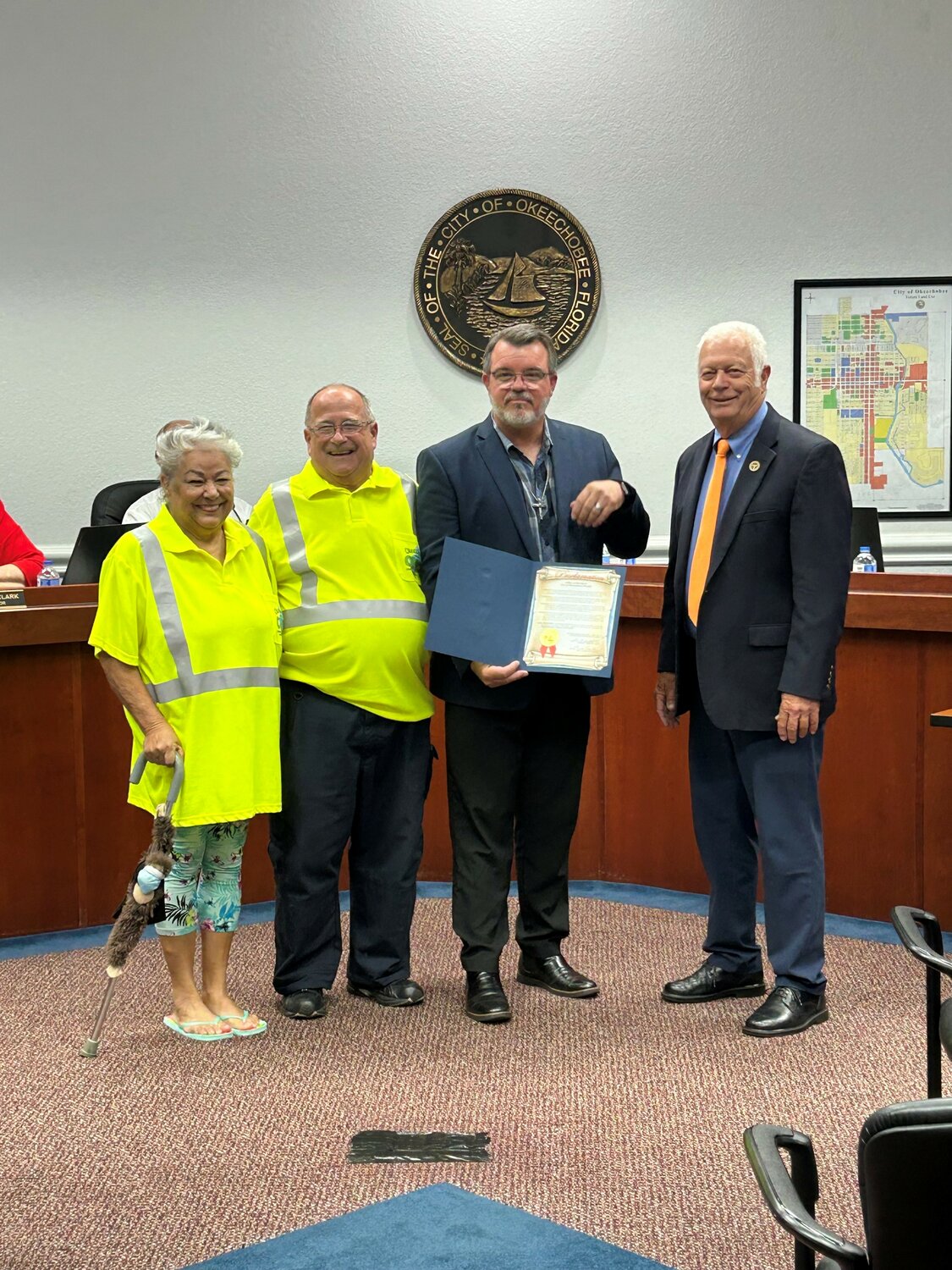 Mayor Dowling Watford (right) proclaims the month of September 2023 as Hunger Action Month. Accepting the proclamation are Juanita and Chuck Akers and Pastor Matt Bowen.